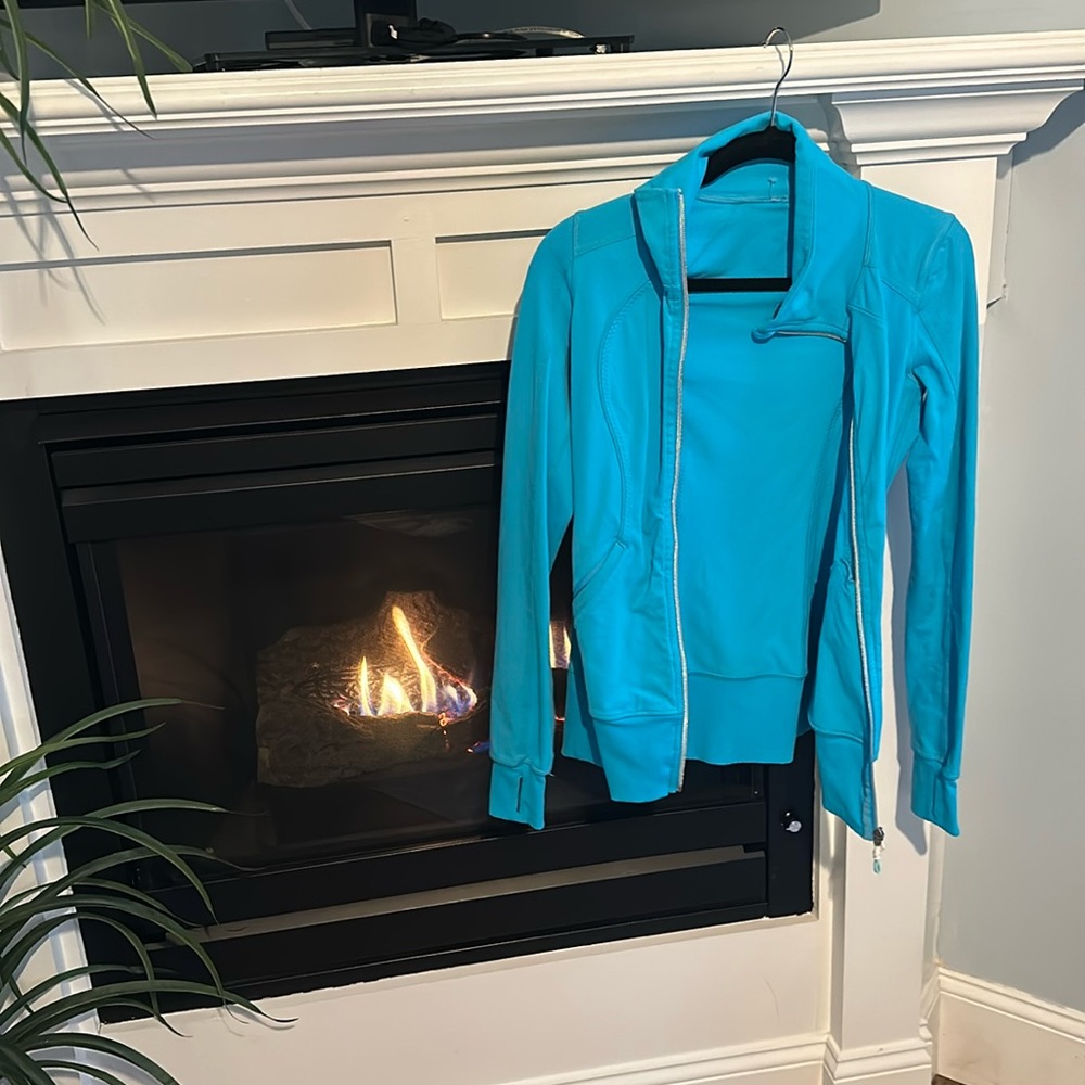 Lululemon, light blue jacket. Size 4. Missing tag. No stains/rips!